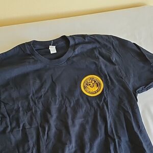 US Navy Blue Tee Shirt Sz Medium.